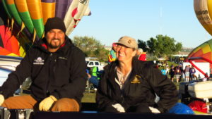 Bert and I in the back of the chase vehicle leaving the field